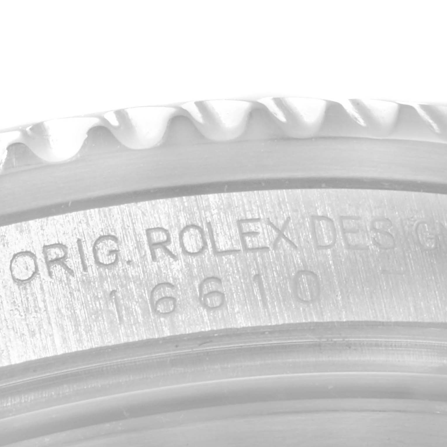This is a close-up view of the watch case side engraving on a Rolex Submariner 16610LV Men
s Stainless Steel Black Dial 16610LV Men
s Stainless Steel Black Dial, showing part of the bezel and model number 16610.