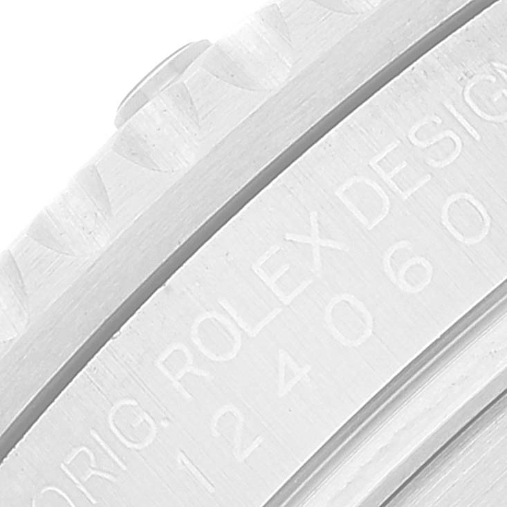 The image shows a close-up of the side engraving on a Rolex Submariner 124060 Men
s Stainless Steel Black Dial 124060 Men
s Stainless Steel Black Dial watch, focusing on the model number and branding.