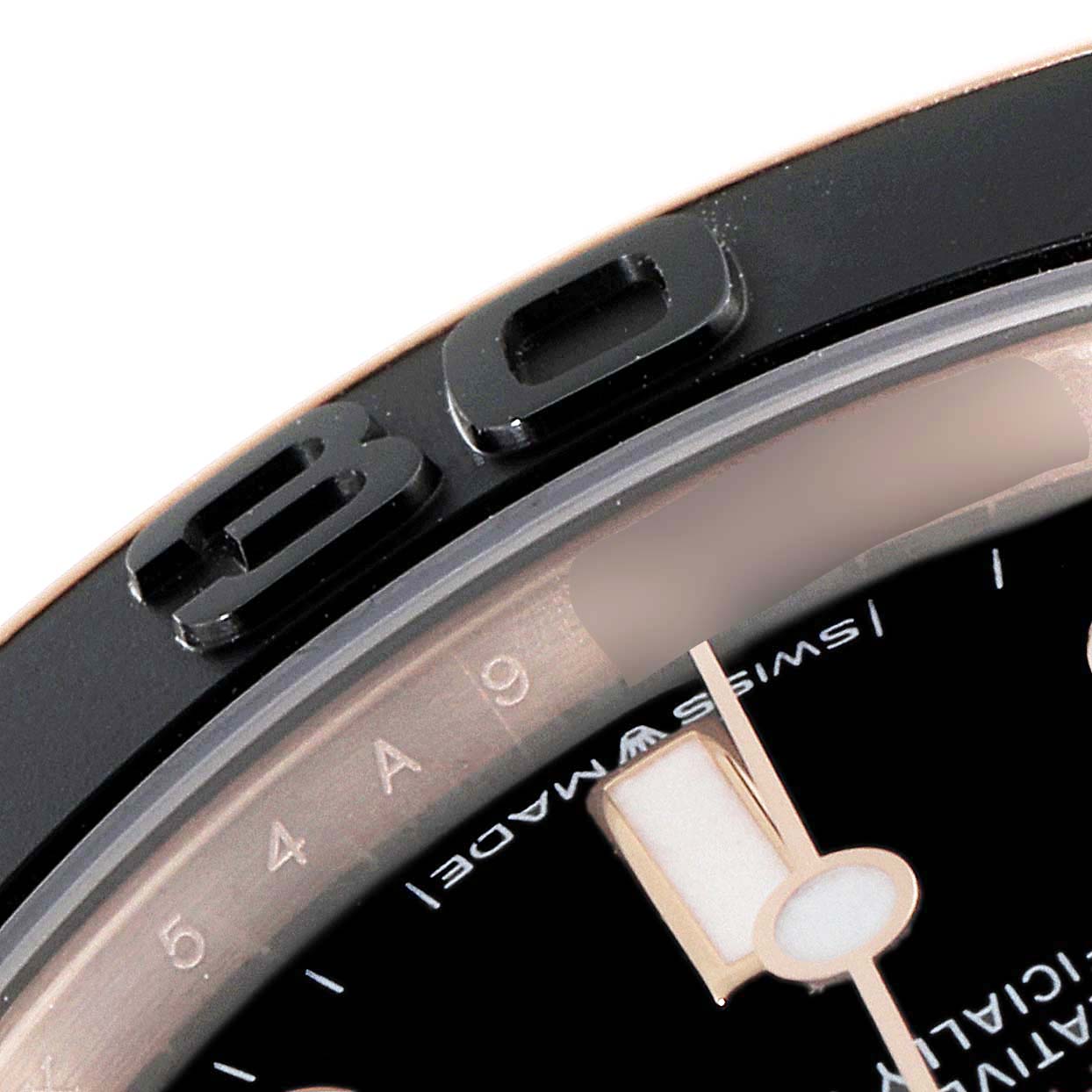 The image shows a close-up of the bezel and a part of the dial with the minute hand of a Rolex Yacht-Master 268655 Men's Rose Gold Black Dial 268655 Men's Rose Gold Black Dial watch.