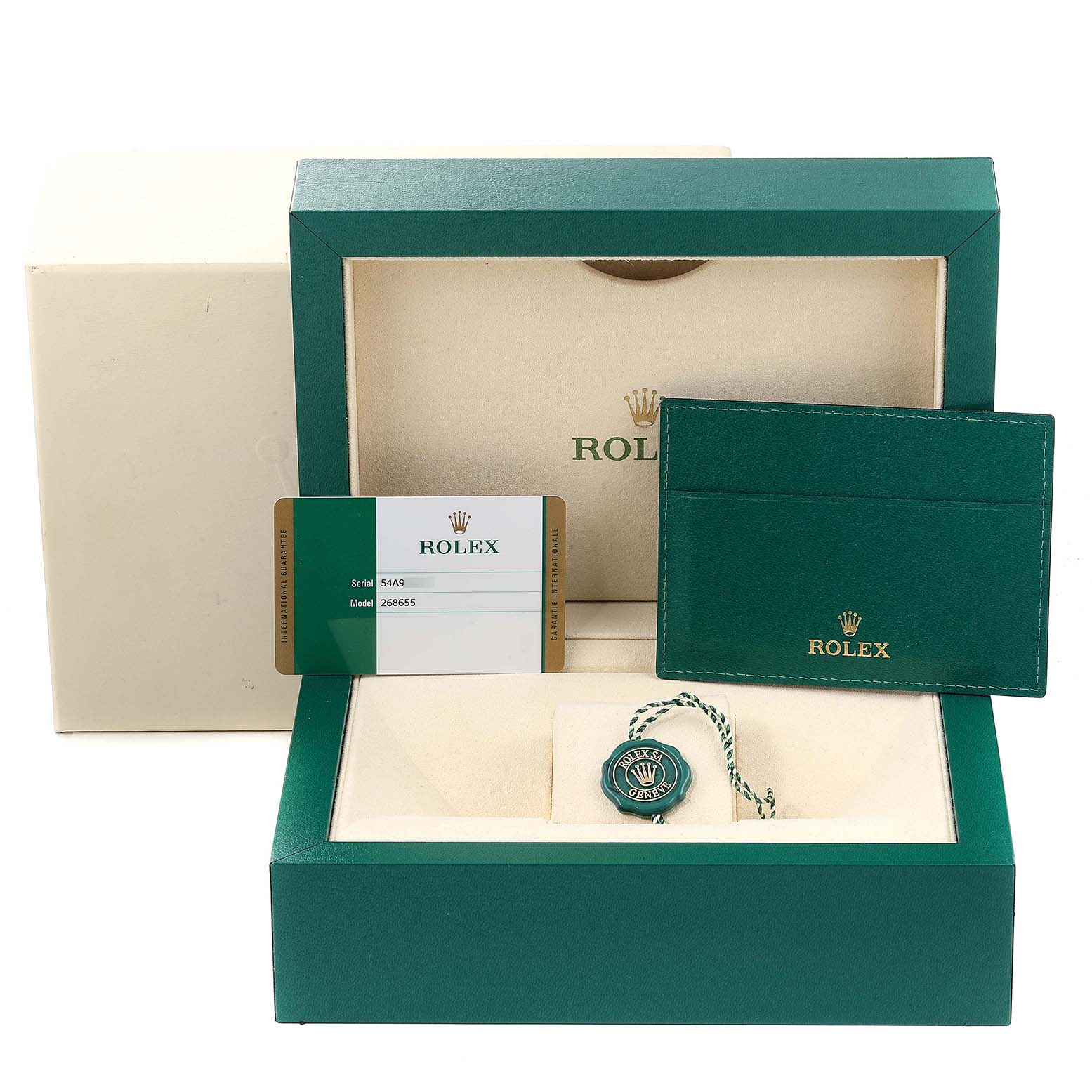 This image shows the packaging and accessories for the Rolex Yacht-Master 268655 Men's Rose Gold Black Dial 268655 Men's Rose Gold Black Dial, including the box, tag, card, and cardholder.