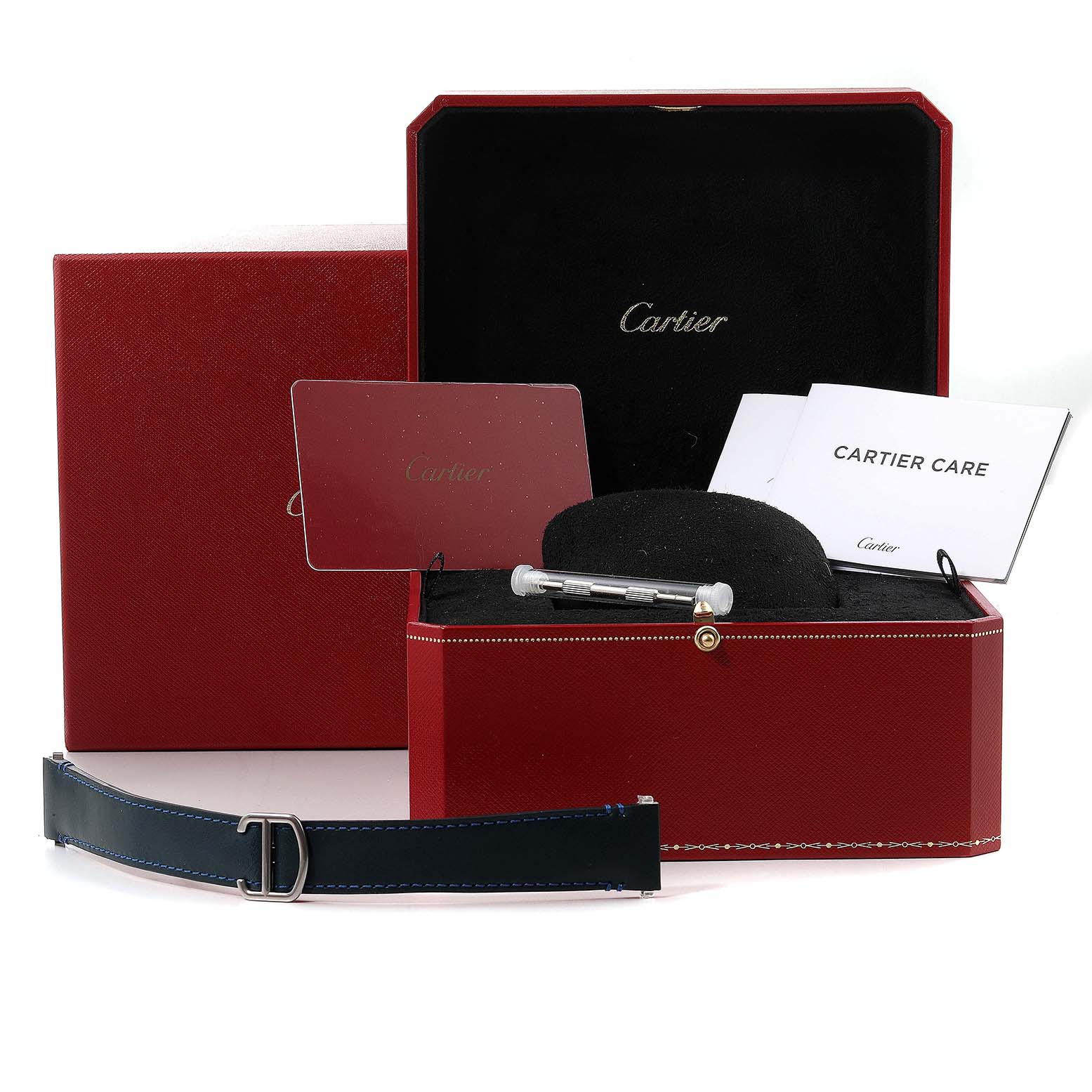 The image shows the box, documents, a band, and tools for the Santos model watch by Cartier.