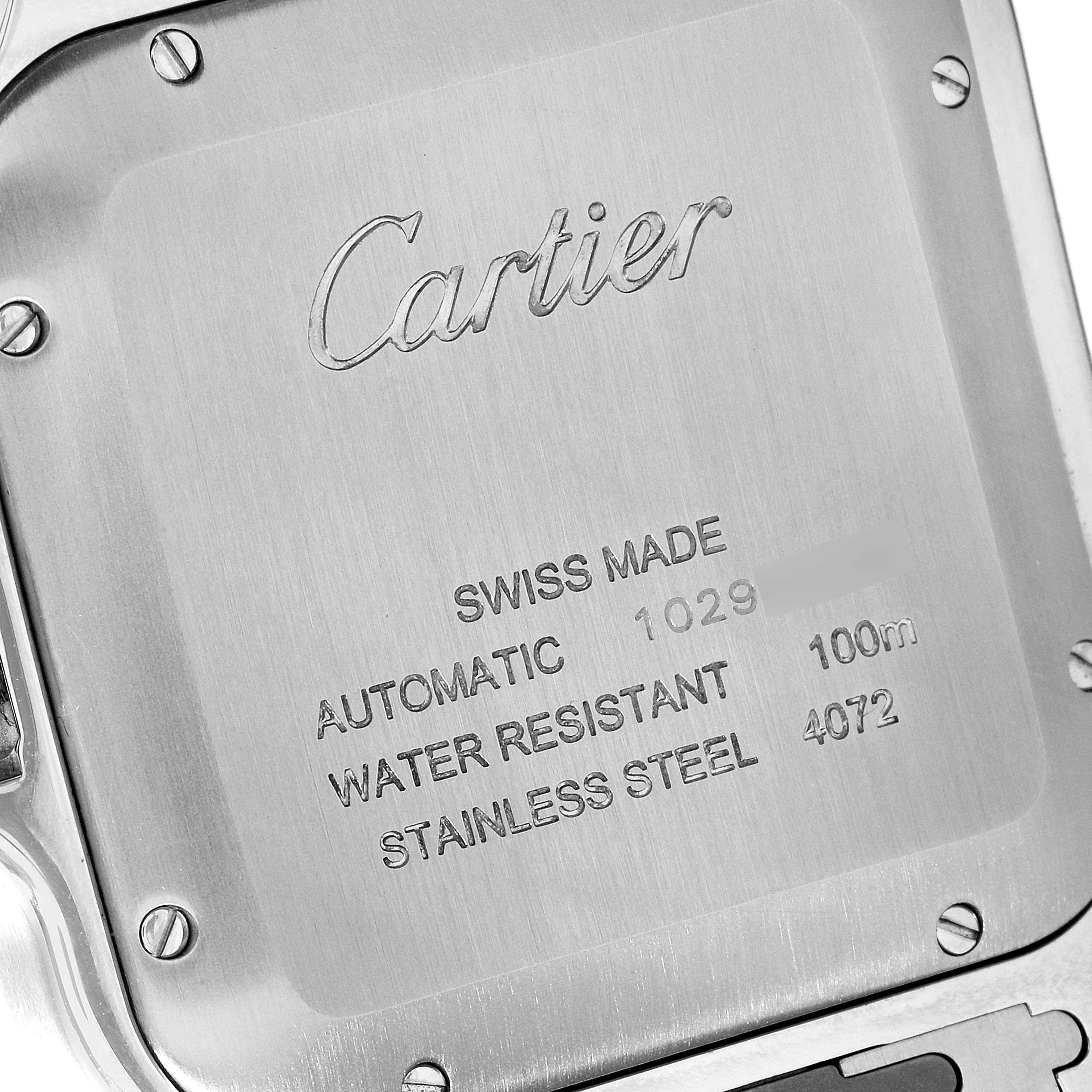 The image shows the back case of a Santos model watch by Cartier, highlighting its specifications and branding.