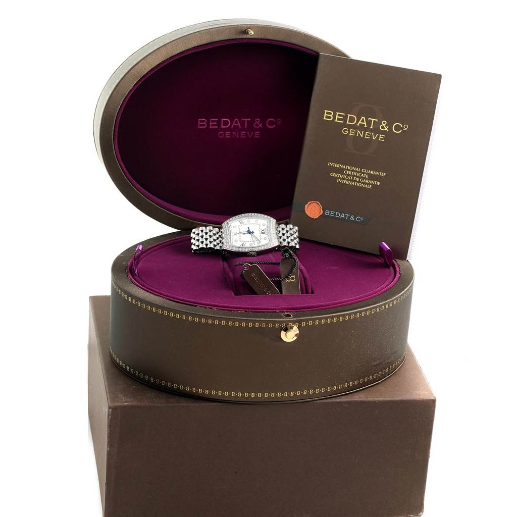 The Bedat 315.071.109 Women's Stainless Steel Silver Dial 315.071.109 Women's Stainless Steel Silver Dial No. 3 Stainless Steel Diamond Ladies Watch 315.071.109 Unworn is displayed inside its box, with a booklet beside it.