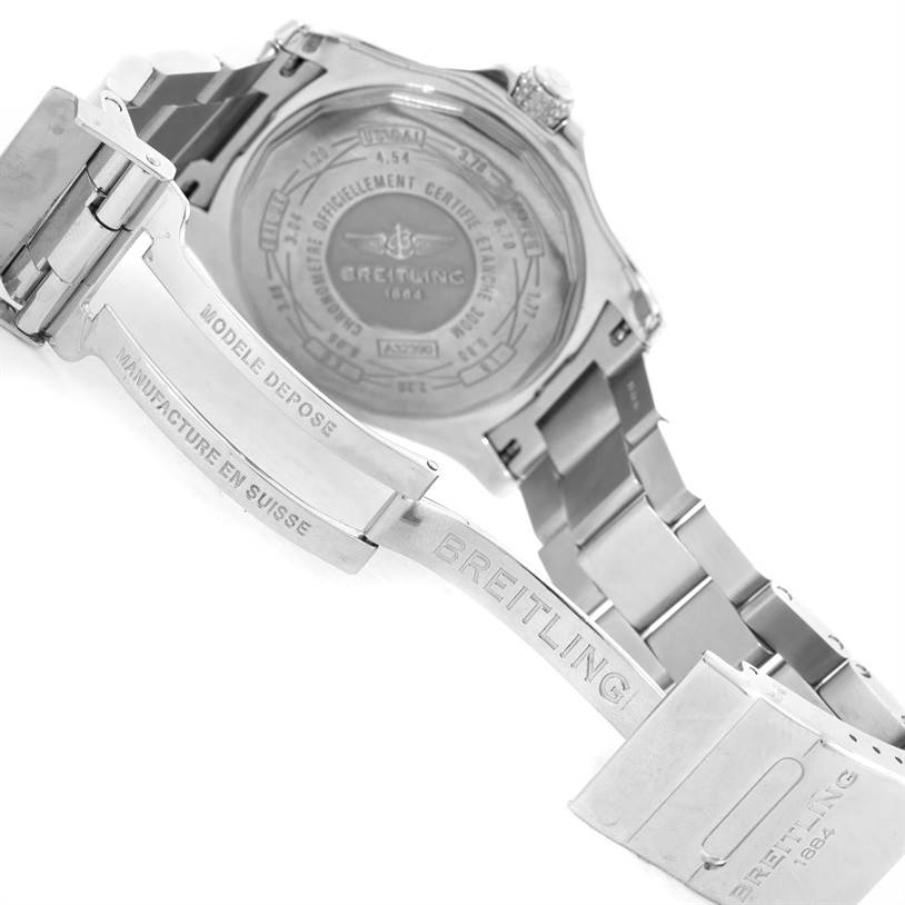 The image shows the back and clasp of a Breitling Avenger A32390 Men's Stainless Steel Blue Dial A32390 Men's Stainless Steel Blue Dial watch, highlighting the engraving and metal bracelet.