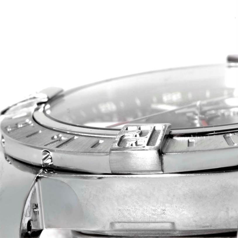 The image shows a close-up angle of the bezel and part of the case of the Breitling Avenger A32390 Men's Stainless Steel Black Dial A32390 Men's Stainless Steel Black Dial watch.