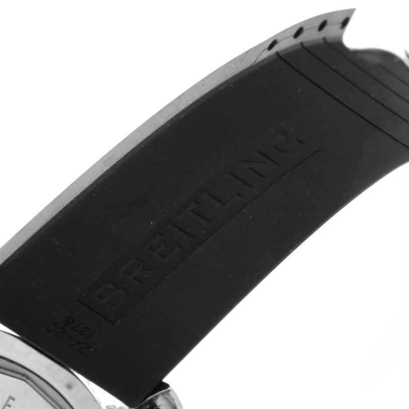 A close-up angle showing the black rubber strap of the Breitling Superocean A17320 Men's Stainless Steel Blue Dial A17320 Men's Stainless Steel Blue Dial watch with "BREITLING" embossed.