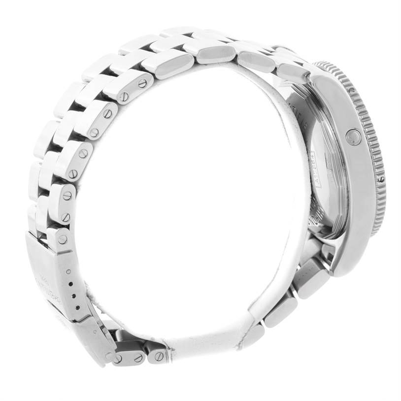 The image shows a side angle of the Breitling Superocean A17364 Men's Stainless Steel Black Dial A17364 Men's Stainless Steel Black Dial watch, highlighting its metal bracelet and part of the case.