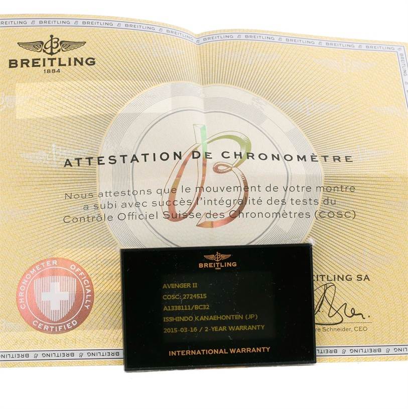 The image displays the warranty card and certification paperwork for the Breitling Avenger A13381 Men's Stainless Steel Black Dial A13381 Men's Stainless Steel Black Dial II watch.