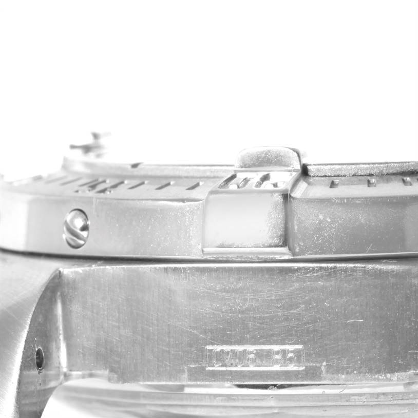 This image shows a close-up side view of the bezel and case of a Breitling Superocean A17390 Men's Stainless Steel Beige Dial A17390 Men's Stainless Steel Beige Dial watch.