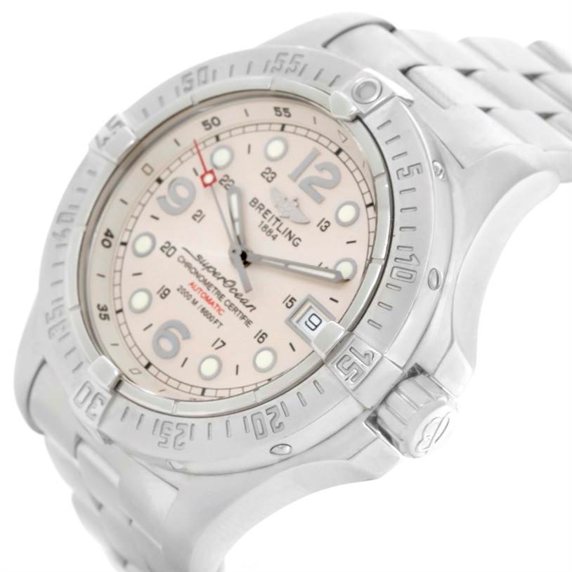 The Breitling Superocean A17390 Men's Stainless Steel Beige Dial A17390 Men's Stainless Steel Beige Dial watch is shown at an angled view, highlighting its face, bezel, crown, and part of the bracelet.