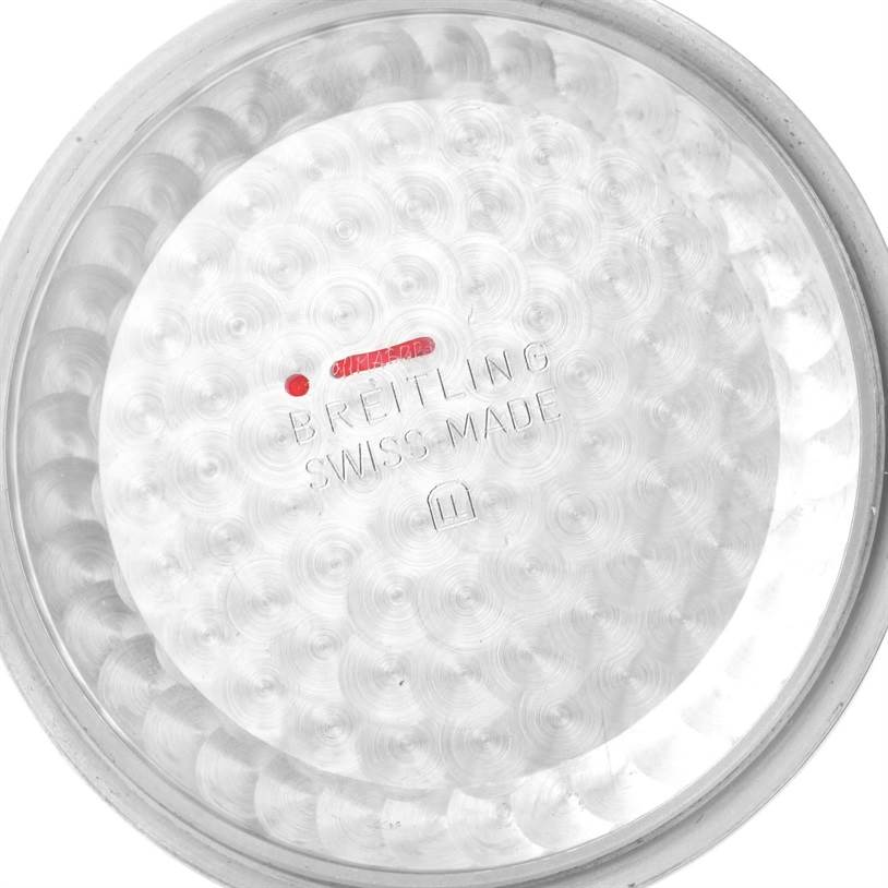 The image shows the inner side of a Superocean by Breitling watch case back, displaying the "Breitling Swiss Made" engraving.