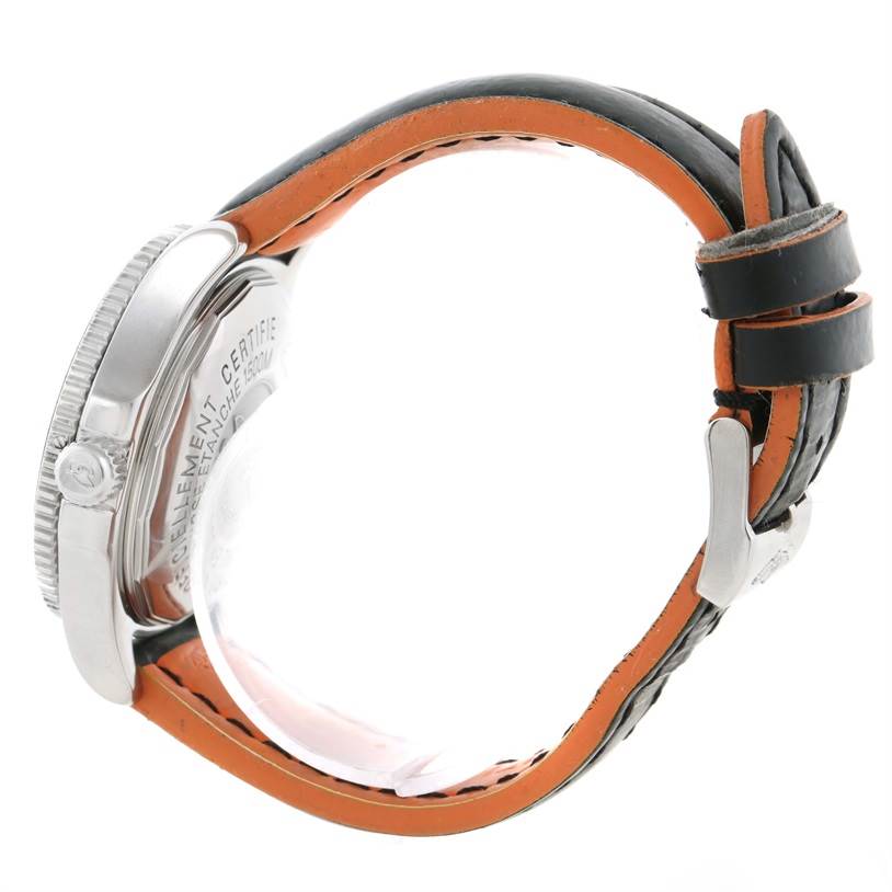 The image shows a side view of a Breitling Superocean A17364 Men's Stainless Steel Black Dial A17364 Men's Stainless Steel Black Dial watch, highlighting the bezel, crown, and leather strap with a buckle.