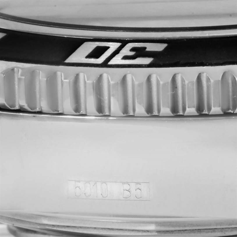 This is a close-up of the bezel and case side of a Breitling Superocean A17364 Men
s Stainless Steel Black Dial A17364 Men
s Stainless Steel Black Dial watch, showing part of the serial number.