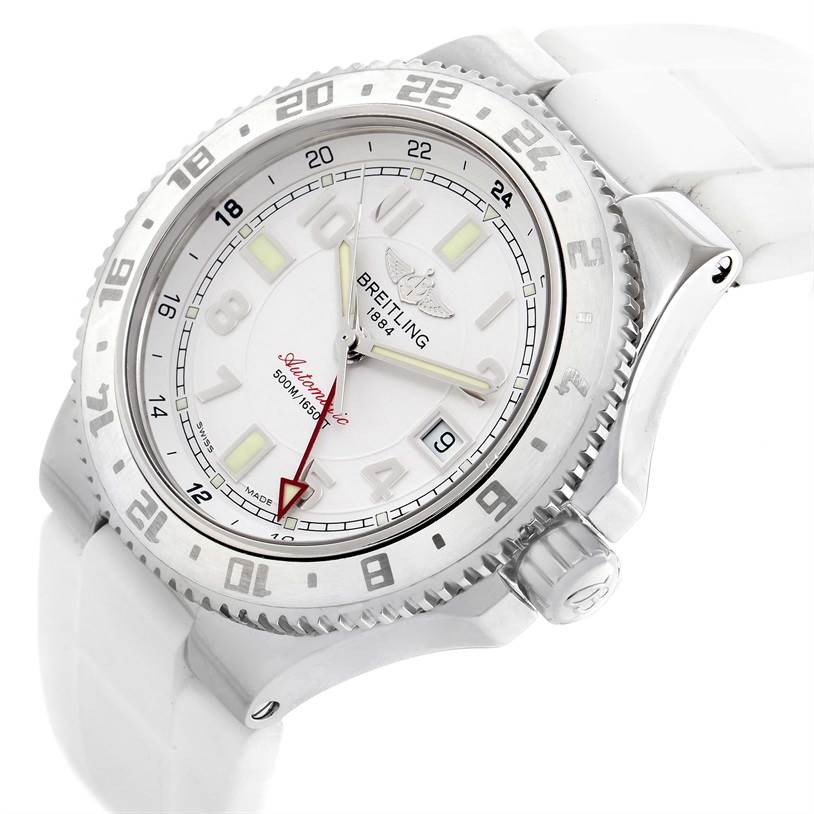 The image shows a close-up, angled view of the face and bezel of the Breitling Superocean A32380A9-A737 Stainless Steel White Dial A32380A9-A737 Stainless Steel White Dial watch, highlighting the white strap and crown.