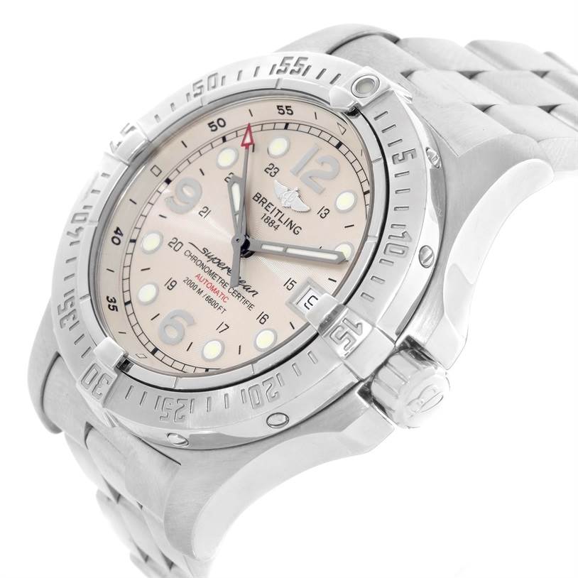 The image shows a close-up side angle of the Breitling Superocean A17390 Men's Stainless Steel White Dial A17390 Men's Stainless Steel White Dial watch, highlighting its bezel, dial, and stainless steel bracelet.