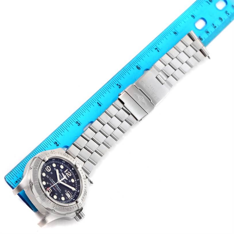 The image shows a top-down view of a Breitling Superocean A17390 Men's Stainless Steel Black Dial A17390 Men's Stainless Steel Black Dial watch with a focus on its bracelet and clasp.