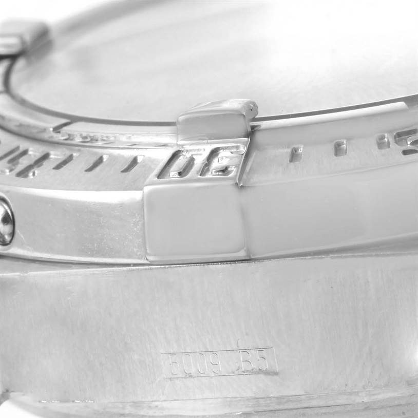 This close-up image shows the bezel and part of the case of a Breitling Superocean A17390 Men's Stainless Steel Black Dial A17390 Men's Stainless Steel Black Dial watch.