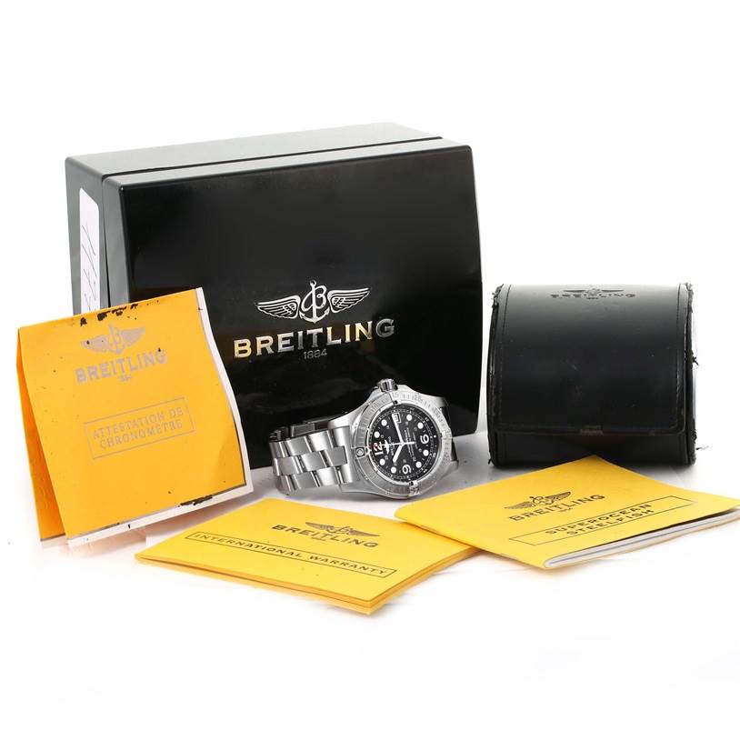 The image shows a Breitling Superocean A17390 Men's Stainless Steel Black Dial A17390 Men's Stainless Steel Black Dial watch with its box, case, manuals, and warranty, viewed from the front.