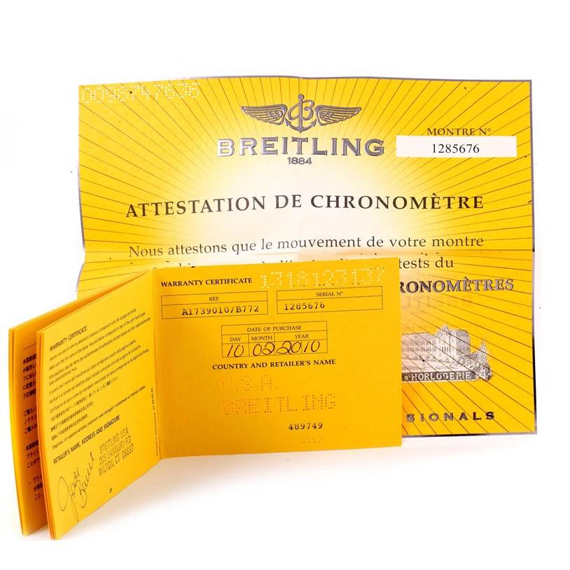 The image shows a warranty certificate and attestation documents for the Breitling Superocean A17390 Men's Stainless Steel Black Dial A17390 Men's Stainless Steel Black Dial watch.