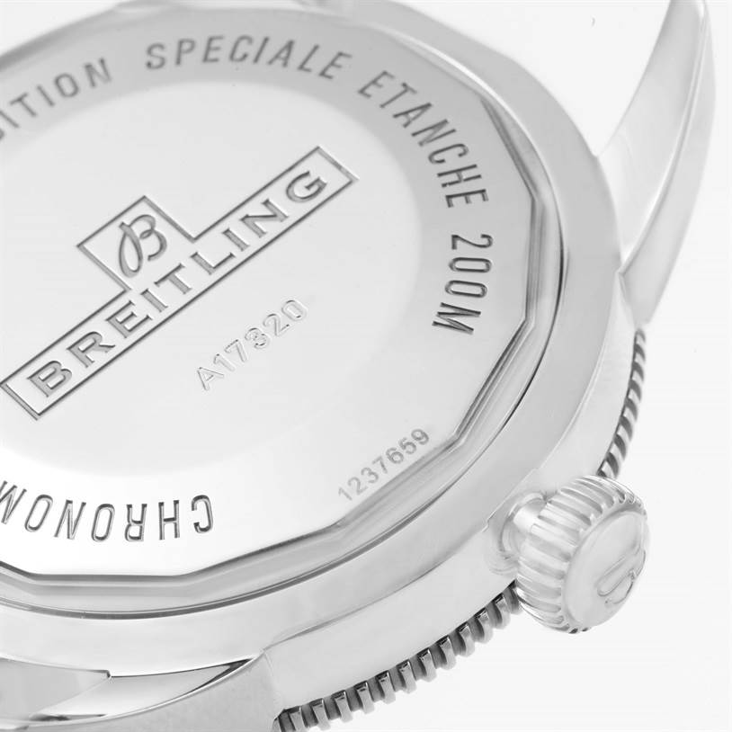 The image shows the back and crown of a Breitling Superocean A17320 Men's Stainless Steel Blue Dial A17320 Men's Stainless Steel Blue Dial watch, highlighting its engravings and water resistance.