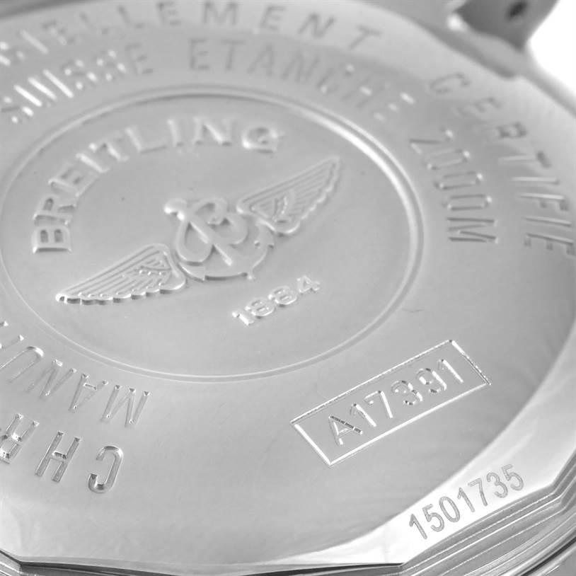 This is an angled close-up of the case back of a Breitling Superocean A17391 Men's Stainless Steel Black Dial A17391 Men's Stainless Steel Black Dial watch, showing the engraved logo, model number, and other inscriptions.