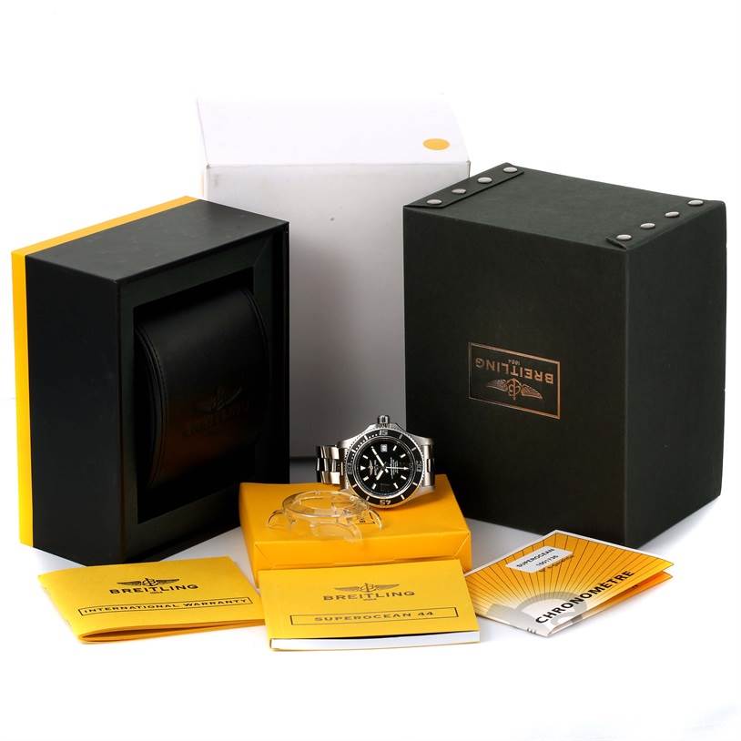 The image shows a Breitling Superocean A17391 Men's Stainless Steel Black Dial A17391 Men's Stainless Steel Black Dial watch, its box, manual, and warranty card from a straight-on angle.
