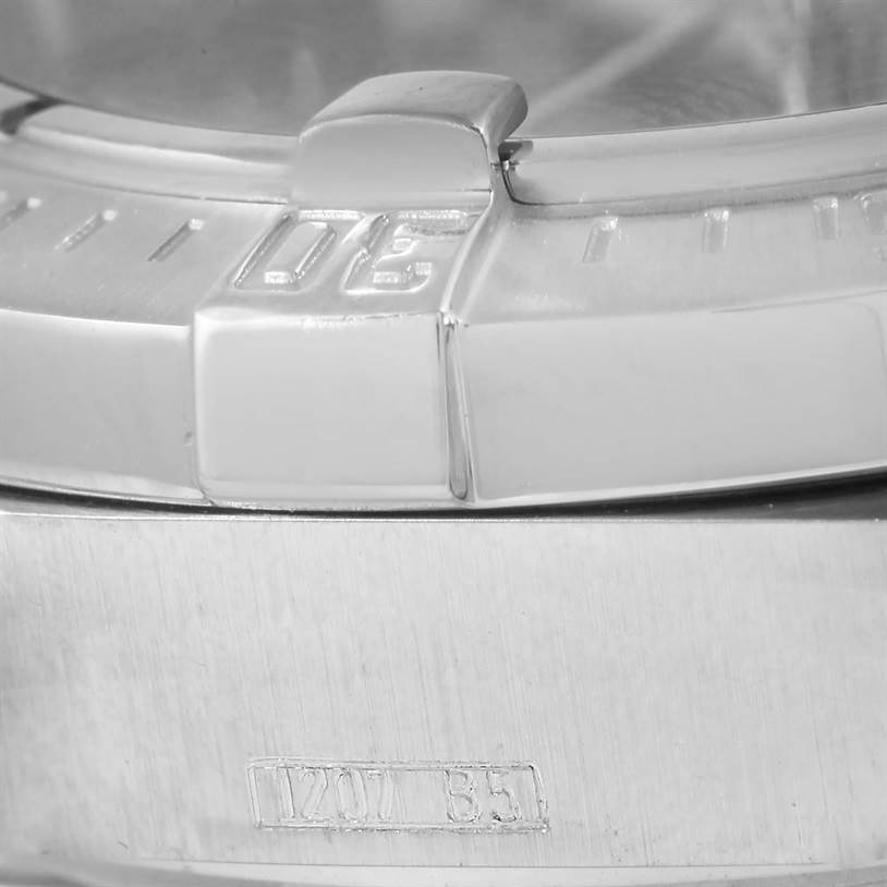 Close-up view of a Breitling Superocean A17390 Men's Stainless Steel Blue Dial A17390 Men's Stainless Steel Blue Dial watch showing the bezel, case, and part of the serial number.