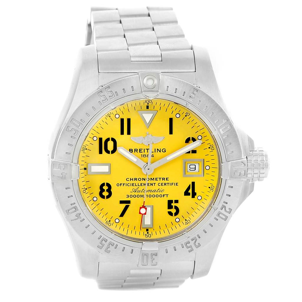The image shows a front view of the Breitling Avenger A17330 Men's Stainless Steel Yellow Dial A17330 Men's Stainless Steel Yellow Dial watch, detailing its yellow dial, date window, and stainless steel bracelet.