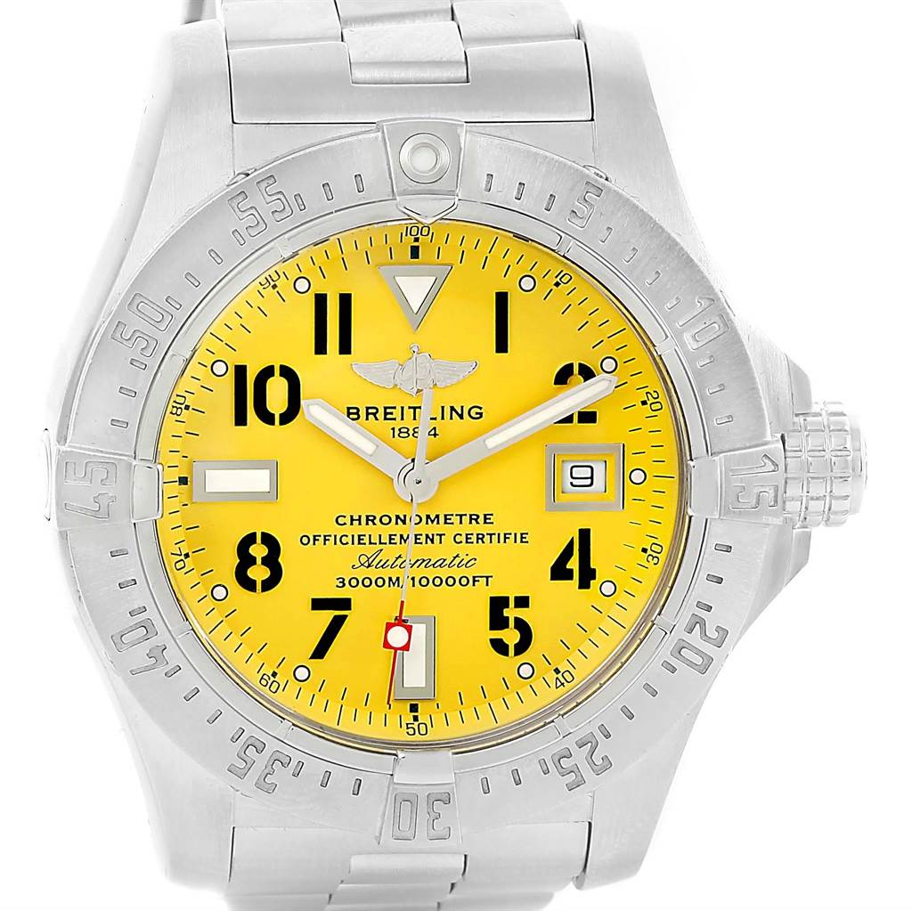 The image shows a front view of a Breitling Avenger A17330 Men's Stainless Steel Yellow Dial A17330 Men's Stainless Steel Yellow Dial watch with a yellow dial, silver bezel, and metal bracelet.