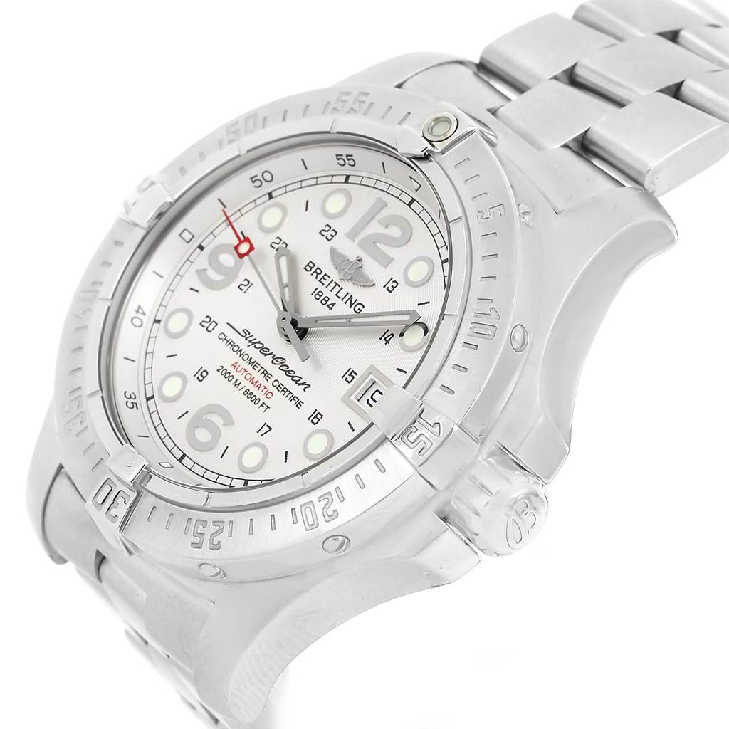 The Breitling Superocean A17390 Men's Stainless Steel Silver Dial A17390 Men's Stainless Steel Silver Dial watch is shown from an angled side view displaying its bezel, dial, and part of the metal bracelet.