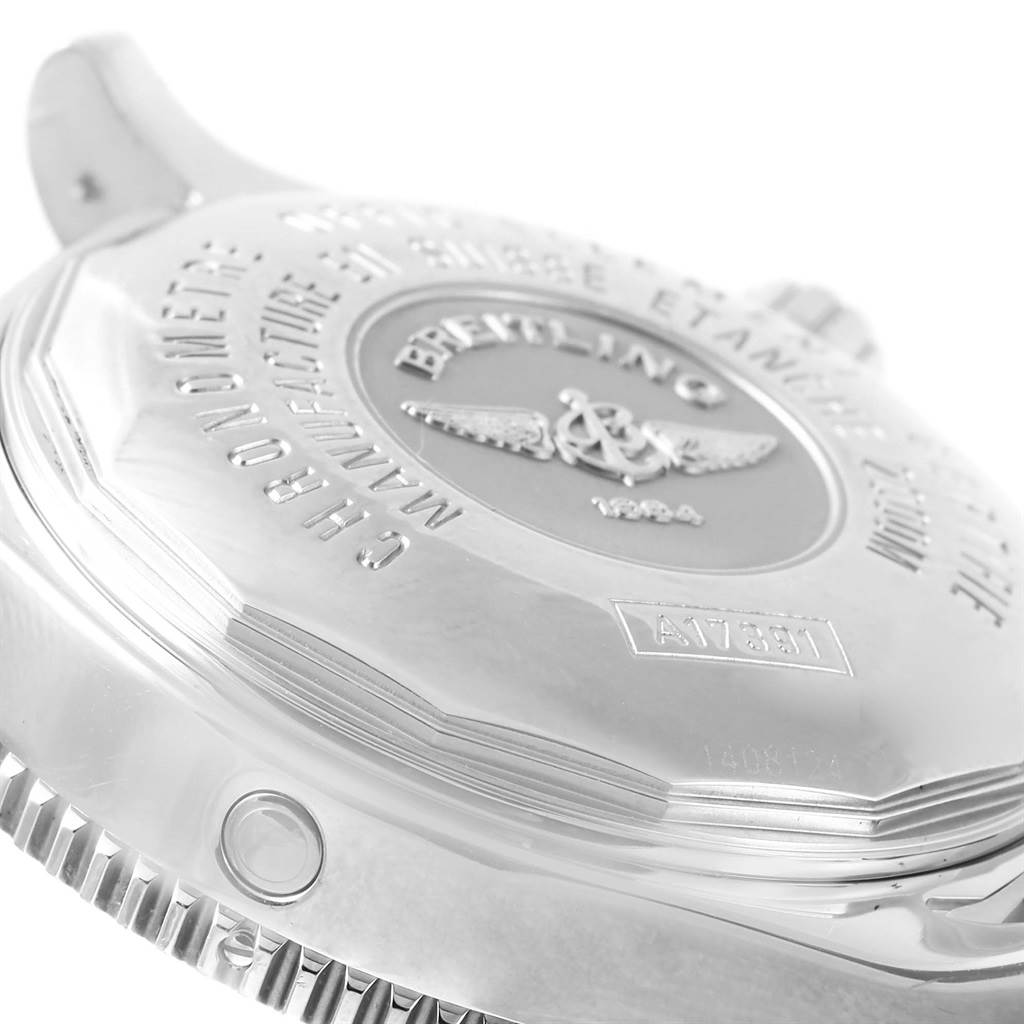 This image shows a close-up angle of the back case of a Breitling Superocean A17391 Men's Stainless Steel Black Dial A17391 Men's Stainless Steel Black Dial watch, highlighting its engravings and metallic texture.