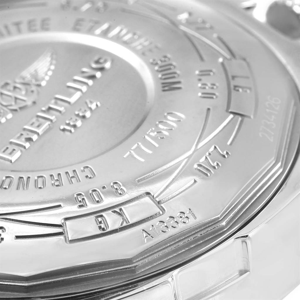This image shows a close-up of the back case of a Breitling Avenger A13381 Men's Stainless Steel White Dial A13381 Men's Stainless Steel White Dial watch, featuring engraved details and logos.