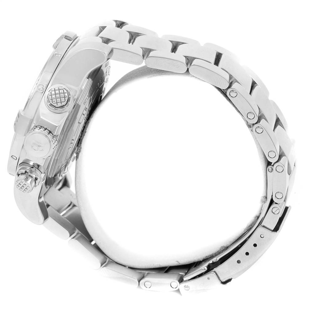 The image shows a side view of the Breitling Avenger A13381 Men's Stainless Steel White Dial A13381 Men's Stainless Steel White Dial watch showcasing the crown, pushers, and metal bracelet.