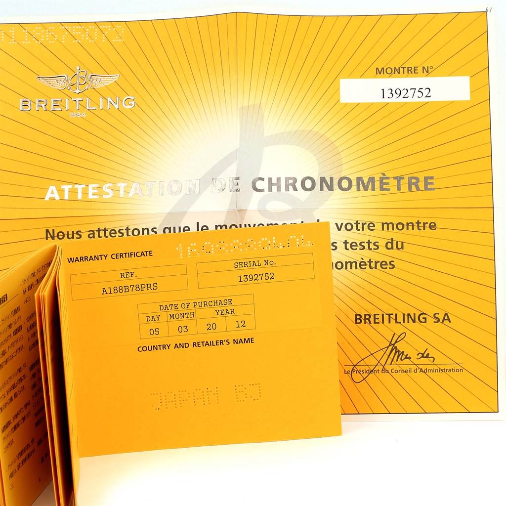 The image shows a flat-lay view of the warranty certificate and chronometer attestation for a Breitling Superocean A17391 Men's Stainless Steel Black Dial A17391 Men's Stainless Steel Black Dial watch.