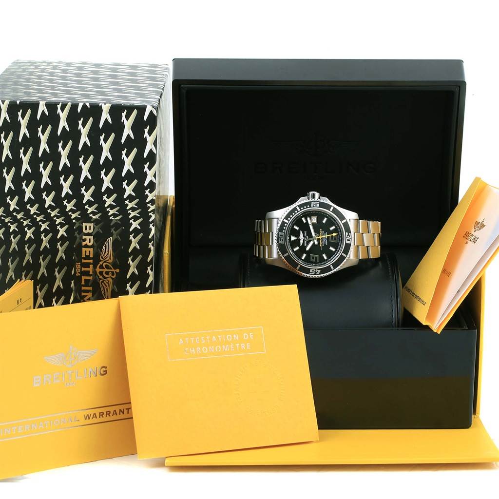 The image shows a Breitling Superocean A17391 Men's Stainless Steel Black Dial A17391 Men's Stainless Steel Black Dial watch in its box, accompanied by warranty cards and documentation, viewed from the front.