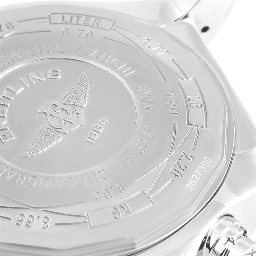 The image shows the back case of a Breitling Avenger A13370 Men's Stainless Steel Black Dial A13370 Men's Stainless Steel Black Dial watch, featuring engraved specifications and the Breitling logo.