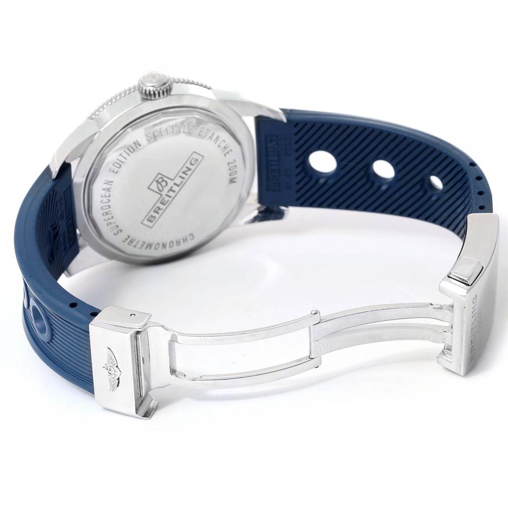 The image shows the back case and clasp of a Breitling Superocean A17320 Men's Stainless Steel Blue Dial A17320 Men's Stainless Steel Blue Dial watch with a blue rubber strap.