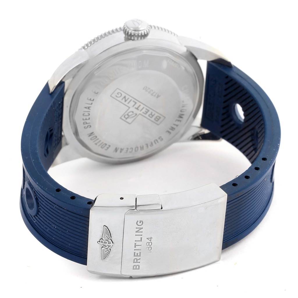 The image shows the back view of a Breitling Superocean A17320 Men's Stainless Steel Blue Dial A17320 Men's Stainless Steel Blue Dial watch, highlighting its case back and blue rubber strap with a silver clasp.