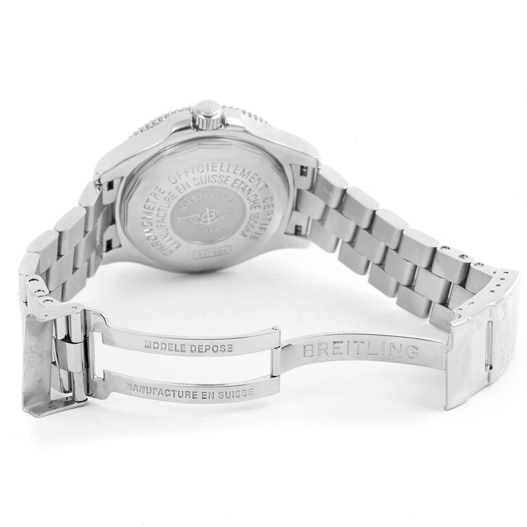 This image shows the back view of a Breitling Superocean A17364 Men's Stainless Steel Black Dial A17364 Men's Stainless Steel Black Dial watch, highlighting the engraved case back and partially opened metal bracelet clasp.