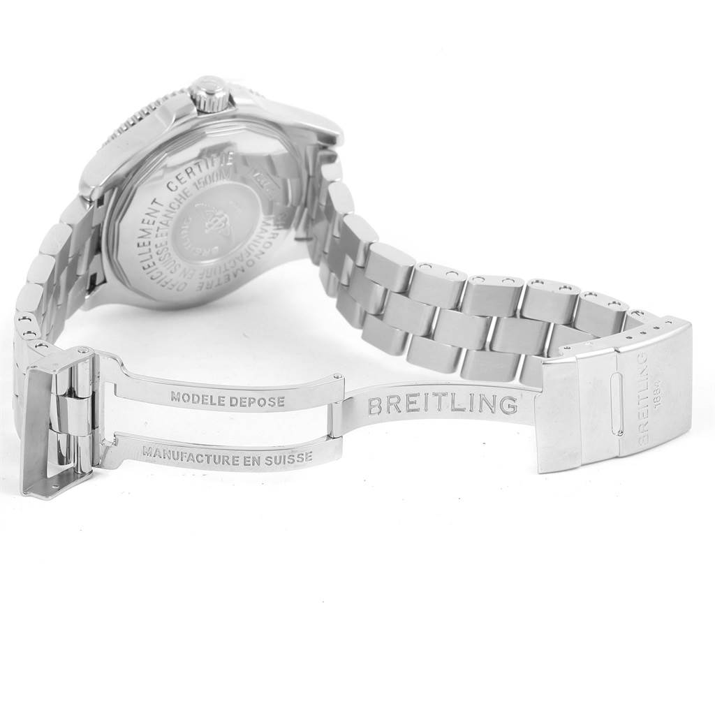 This image shows the back of a Breitling Superocean A17364 Men's Stainless Steel Black Dial A17364 Men's Stainless Steel Black Dial watch and the open metal bracelet with visible brand engravings.