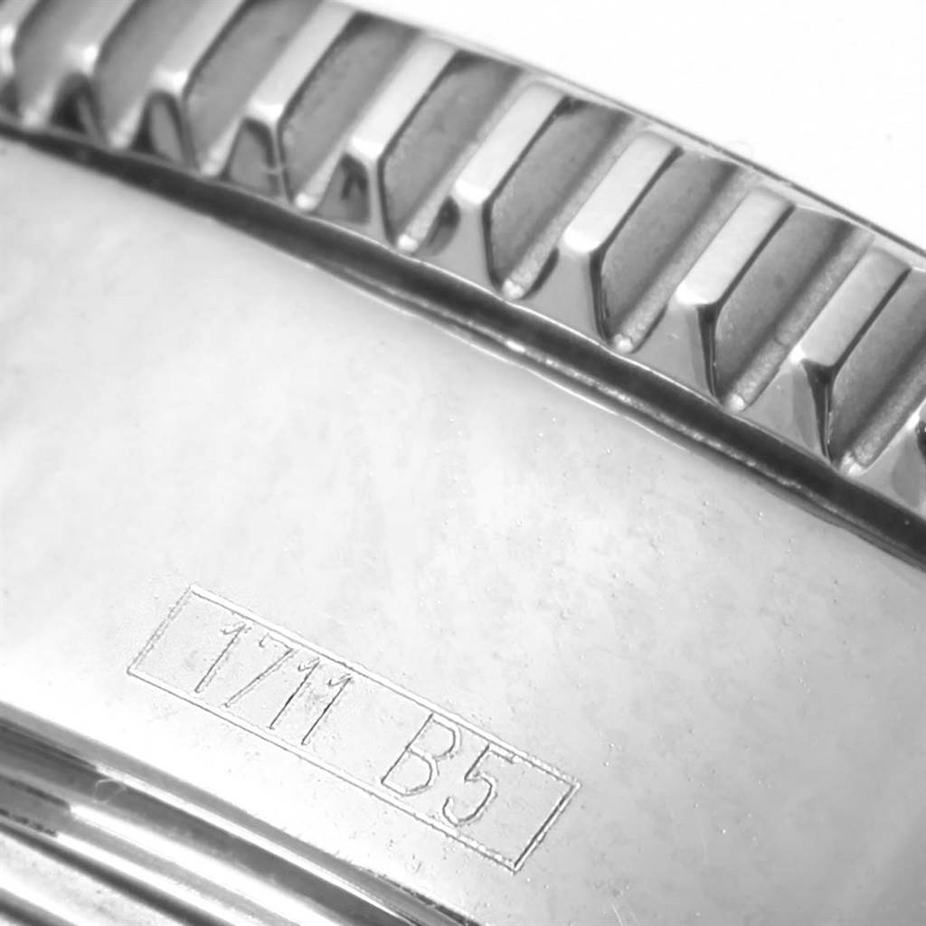 Close-up of the bezel and engraved serial number on the Breitling Superocean A17364 Men's Stainless Steel Black Dial A17364 Men's Stainless Steel Black Dial watch.