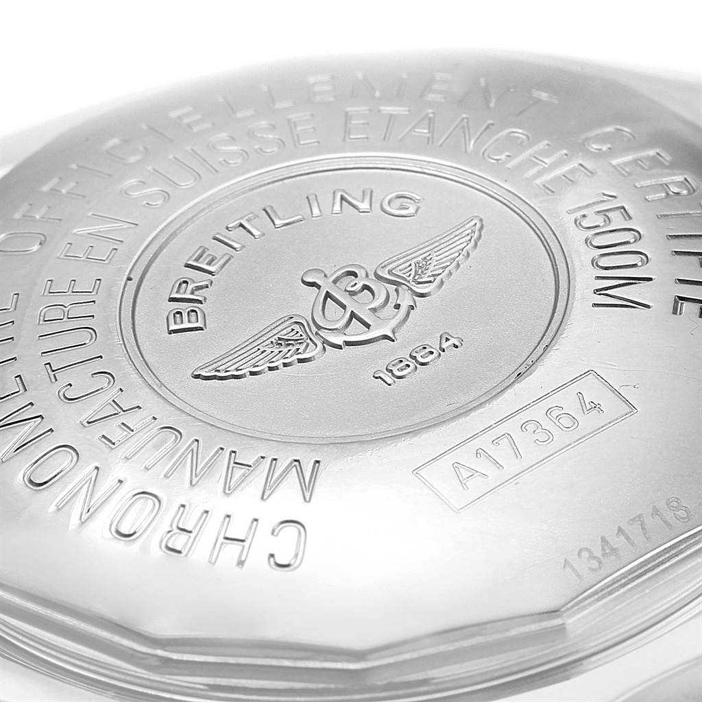 The image shows the back casing of a Breitling Superocean A17364 Men's Stainless Steel Black Dial A17364 Men's Stainless Steel Black Dial watch with engraved details and logos.