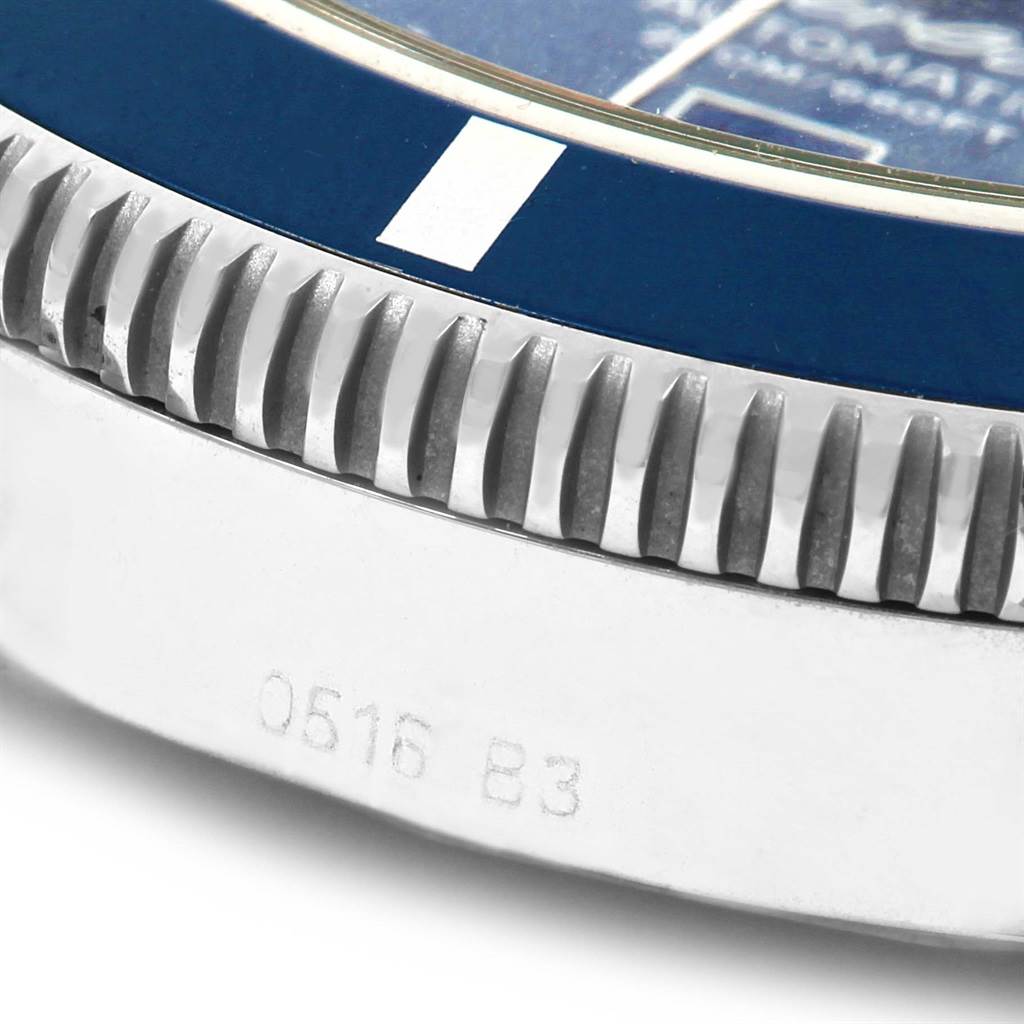 This close-up angle of the Breitling Superocean A17320 Men's Stainless Steel Blue Dial A17320 Men's Stainless Steel Blue Dial model shows part of the bezel and the edge of the dial.