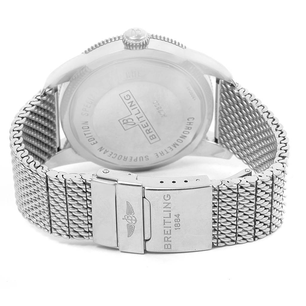 The image shows the back view of a Breitling Superocean A17320 Men's Stainless Steel Blue Dial A17320 Men's Stainless Steel Blue Dial watch, highlighting its case back and mesh bracelet with the Breitling logo on the clasp.