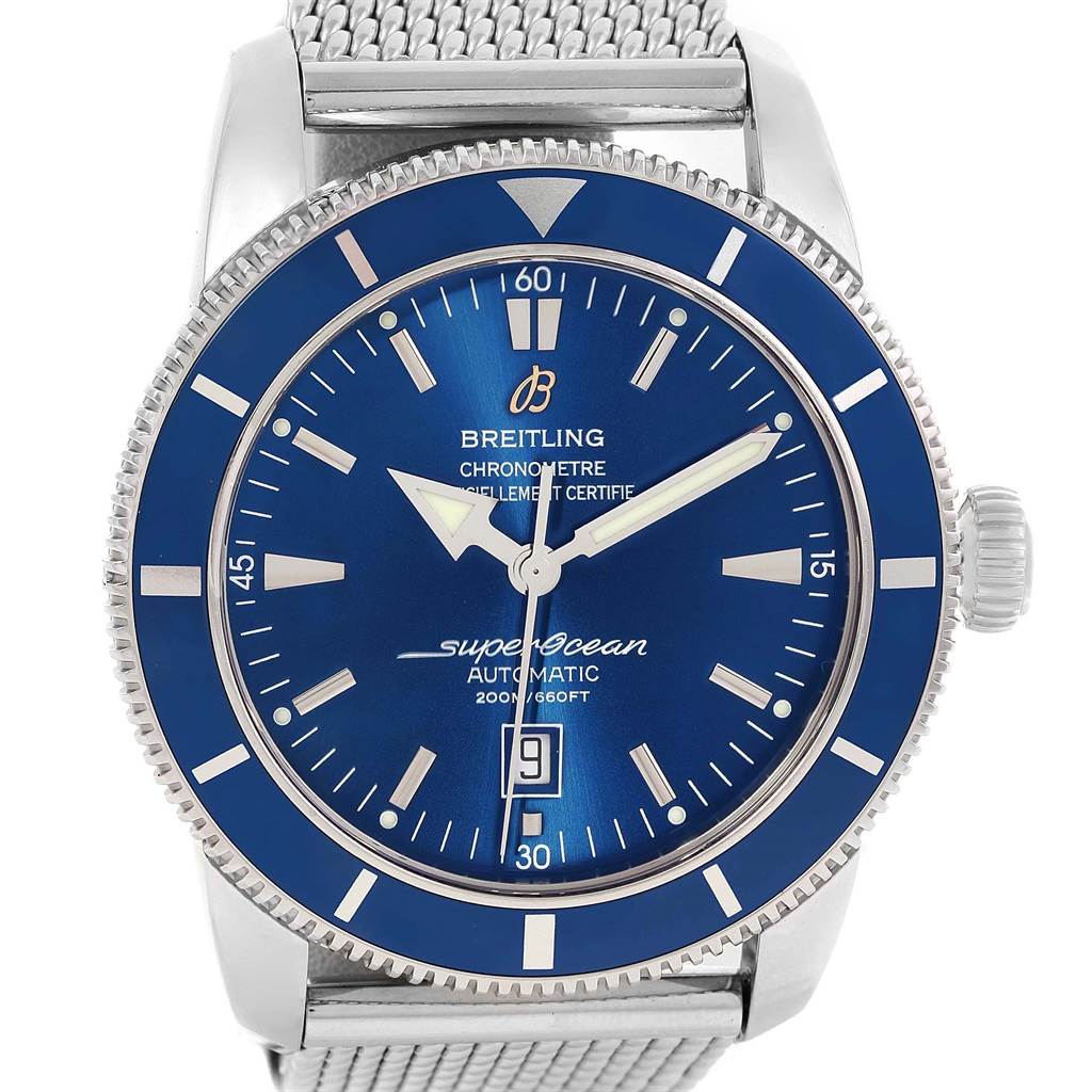 The image shows a front view of the Breitling Superocean A17320 Men's Stainless Steel Blue Dial A17320 Men's Stainless Steel Blue Dial watch displaying its blue dial, markers, hands, bezel, date window, and mesh strap.