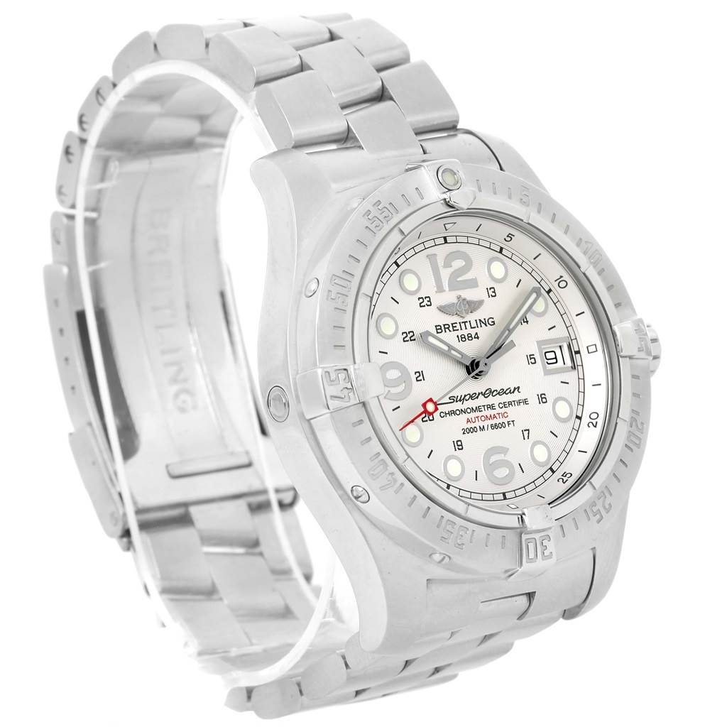 This image shows a Breitling Superocean A17390 Men's Stainless Steel Silver Dial A17390 Men's Stainless Steel Silver Dial watch from a three-quarter angle, highlighting the face, bezel, and metal bracelet.