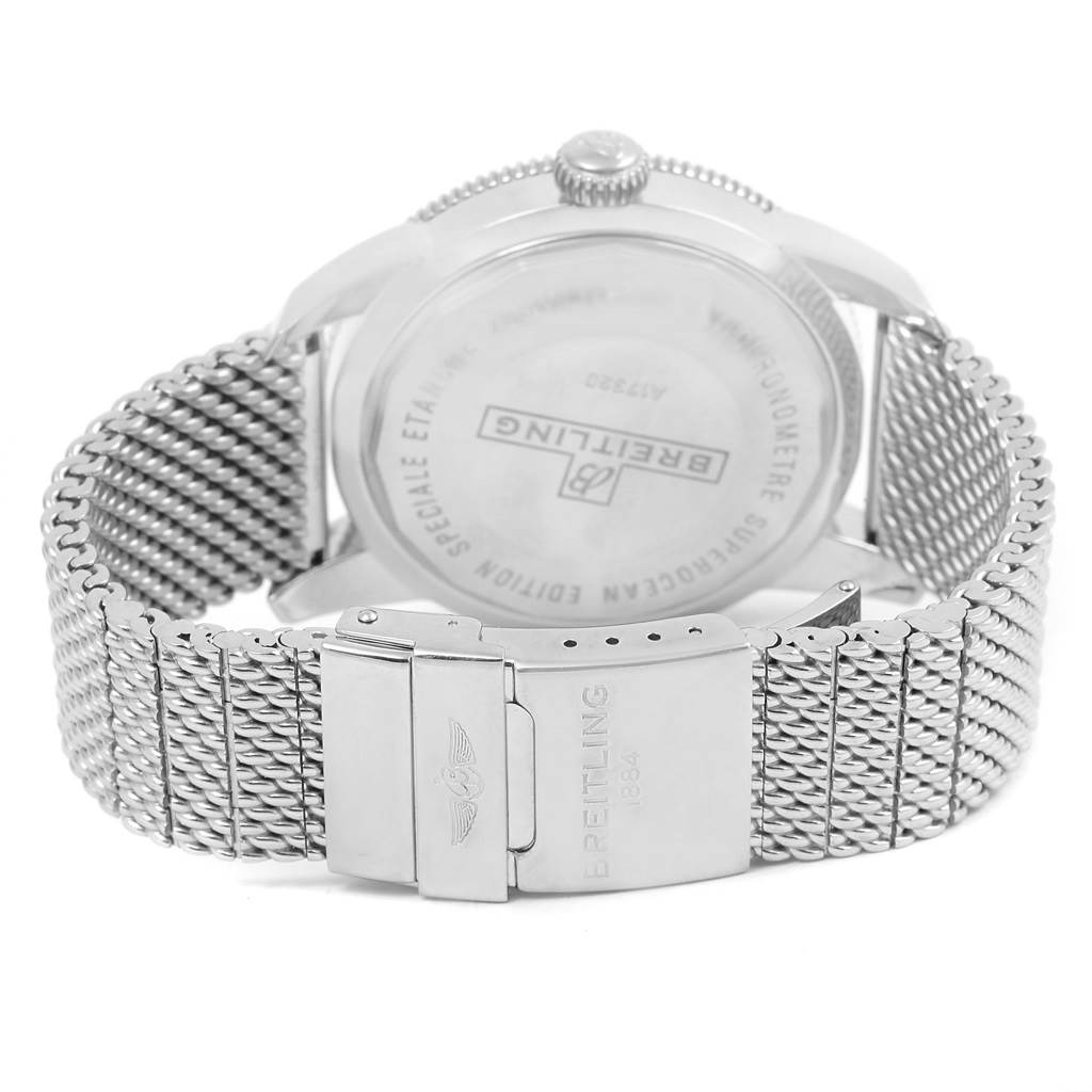The image shows the back case and metal mesh bracelet of a Breitling Superocean A17320 Men's Stainless Steel Blue Dial A17320 Men's Stainless Steel Blue Dial watch at an angled rear view.