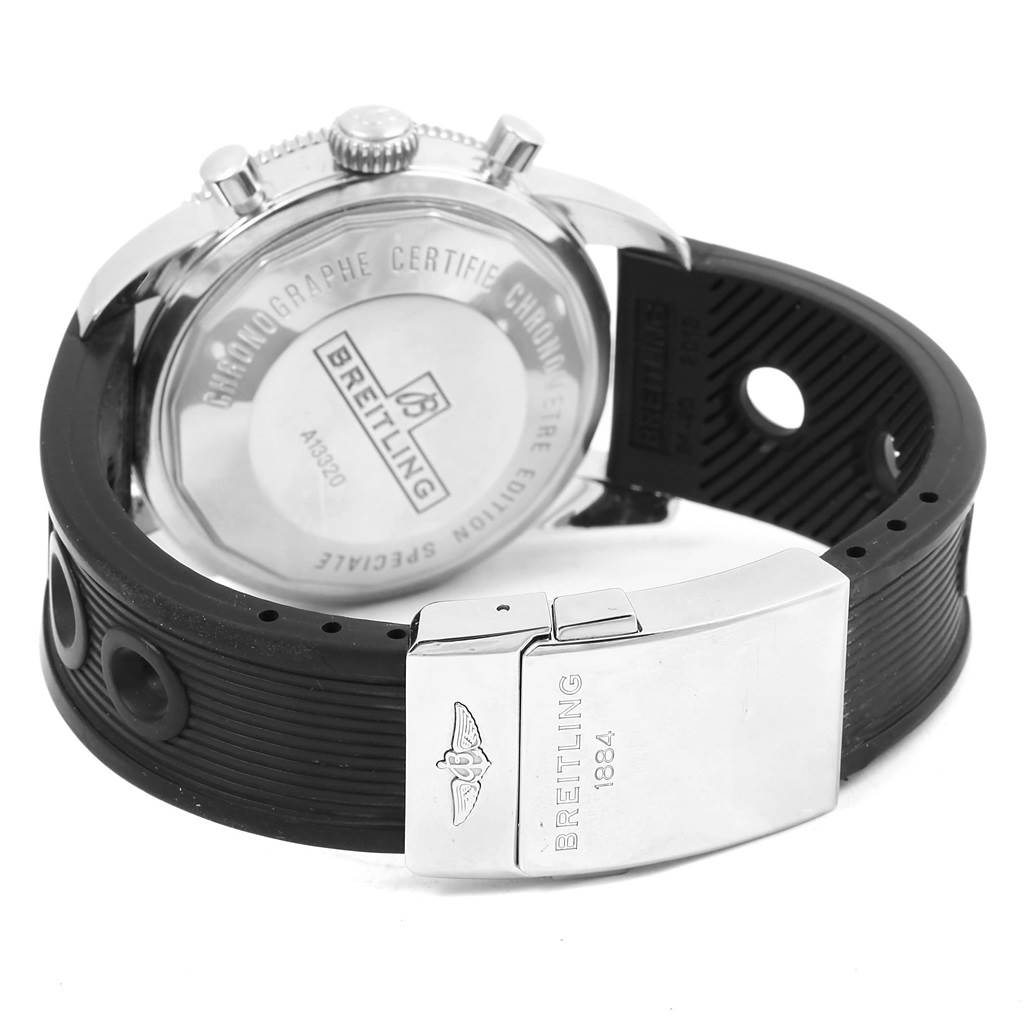 The image shows the back of a Breitling Superocean A13320 Men's Stainless Steel Blue Dial A13320 Men's Stainless Steel Blue Dial watch, featuring its case back, crown, and rubber strap with clasp.