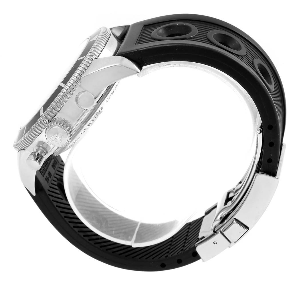 This side view of the Breitling Superocean A13320 Men's Stainless Steel Blue Dial A13320 Men's Stainless Steel Blue Dial watch shows the bezel, crown, pushers, and black rubber strap with a clasp.