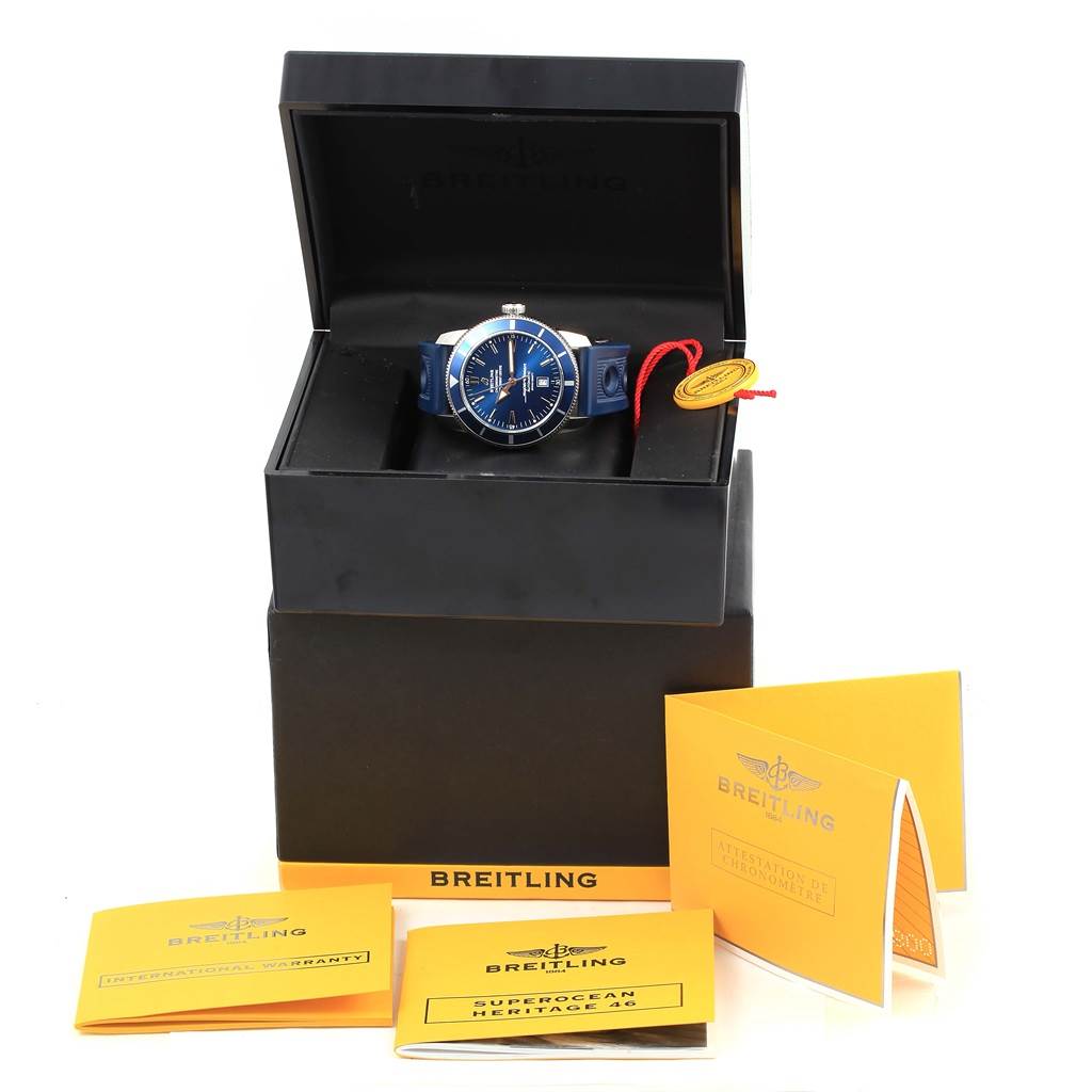 The image shows a Breitling Superocean A17320 Men's Stainless Steel Blue Dial A17320 Men's Stainless Steel Blue Dial watch in its box along with accompanying manuals and warranty cards.
